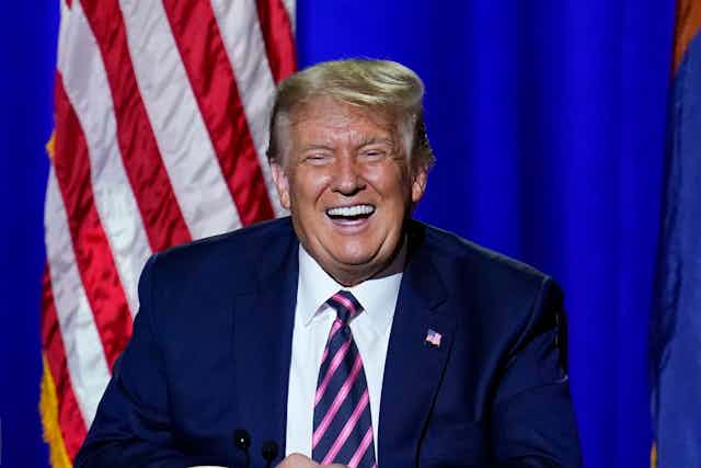 Donald Trump laughs