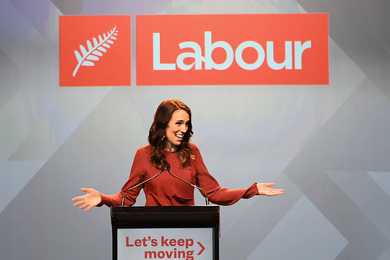 Jacinda Ardern at the podium accepting victory on the election.