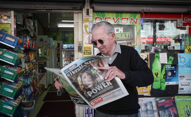 Man reading a newspaper