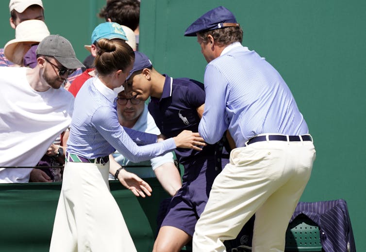 Ballboy fainting in the heat