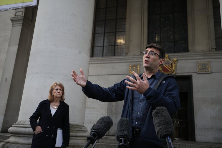 Andy Burnham holding a press conference