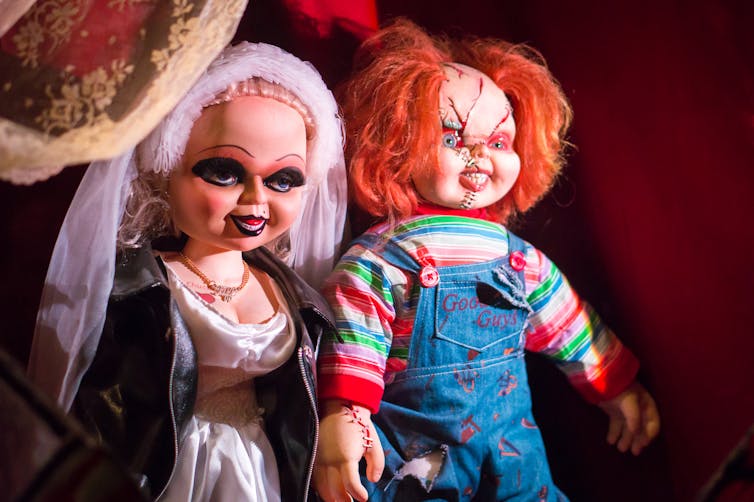 The Bride of Chucky and Chucky, two horror doll characters.