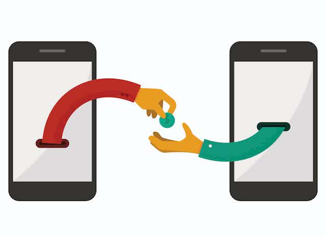 An arm extending from a smartphone screen drops a coin into an outstretched hand emerging from another smartphone screen.