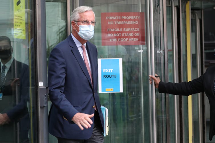 Brexit negotiator Michel Barnier wearing a mask.