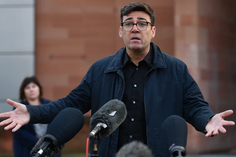 Andy Burnham giving a press conference.
