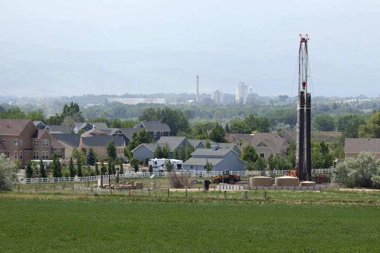 A fracking rig adjacent to a neighborhood in Colorado.