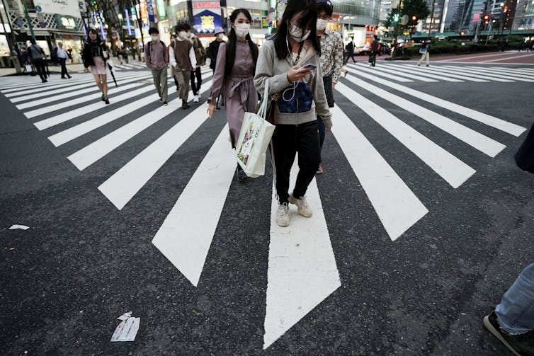 People wearing facemasks in Tokyo, Japan