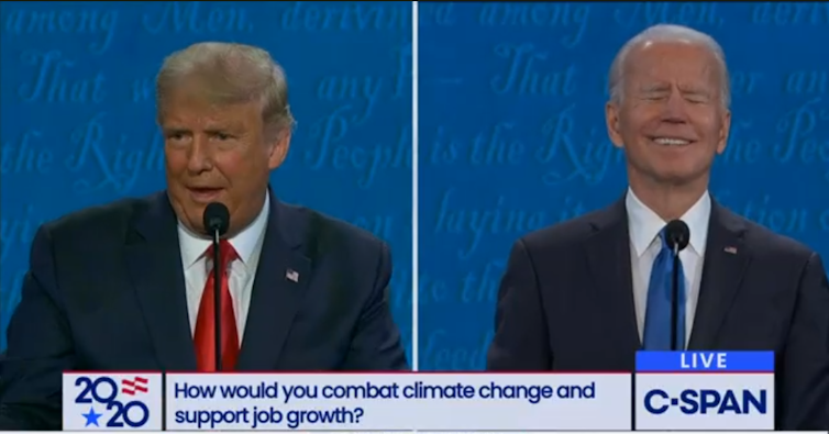 A screenshot from C-SPAN shows Trump talking while Biden laughs