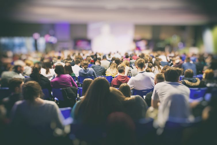 A lecture theatre full of people.