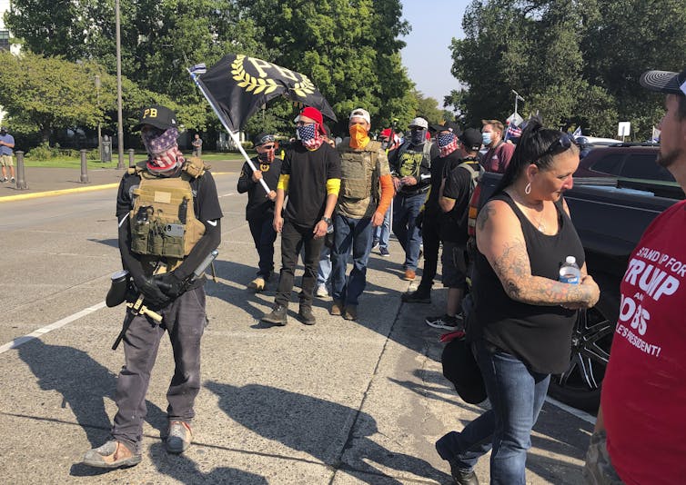 Members of the Proud Boys arrive at an event in Oregon.
