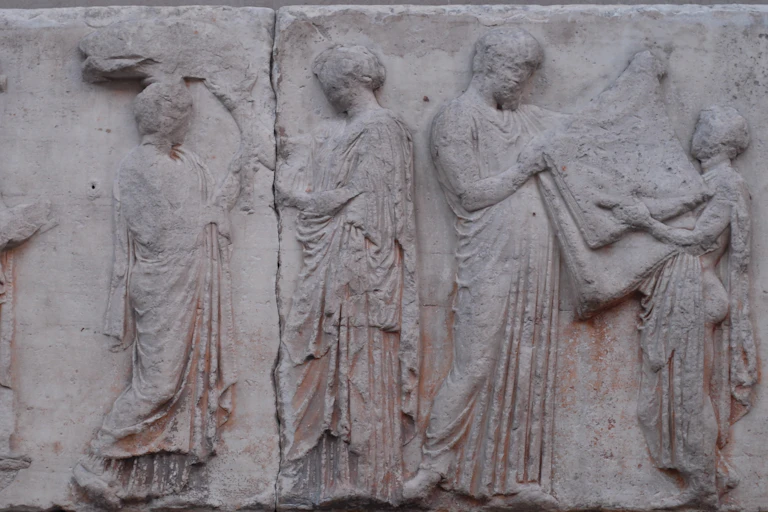 A freeze showing the payment of liturgies for a fesitval.
