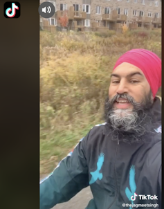 Singh wears a fuschia turban while singing in a TikTok video.