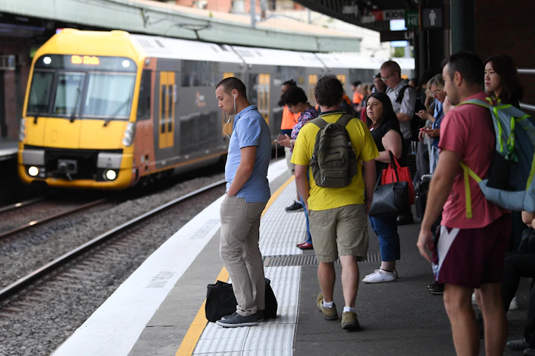 Commuters waiting on platform for a train