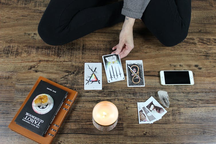 Woman reading tarot.