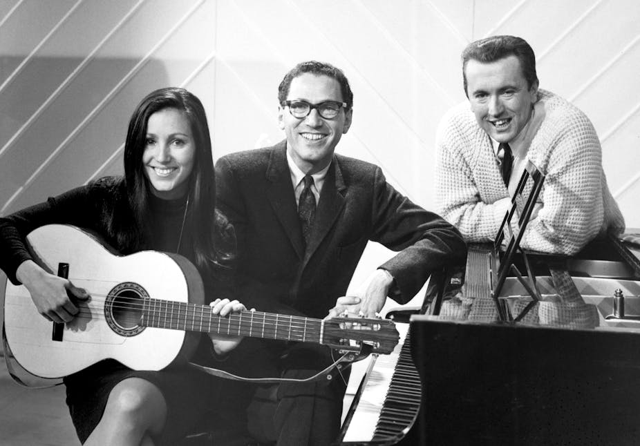 Singer Julie Felix, comedian Tom Lehrer and TV presenter David Frost in BBC's Shepherd's Bush studio in 1966.