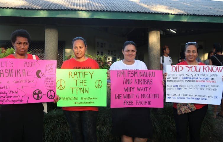 Pacific students marching in support of the treaty on the prohibition of nuclear weapons