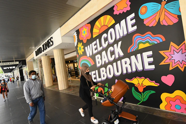A mural reading Welcome Back Melbourne