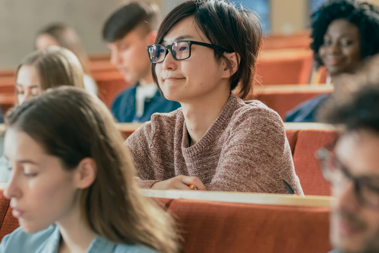 Students listening in lecture hall