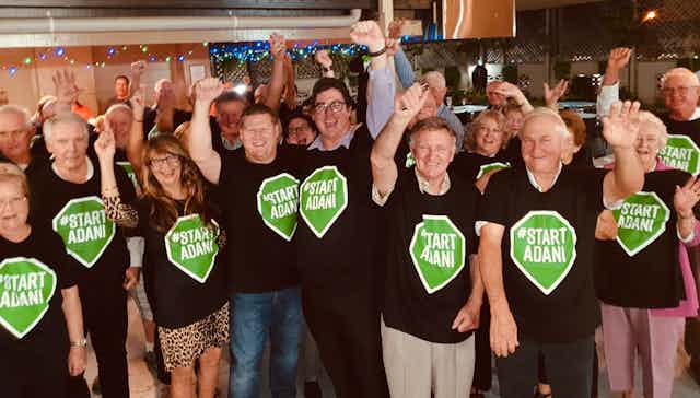 Queenslanders cheering in support of the Adani mine