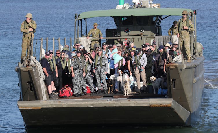 Evacuees on a landing craft