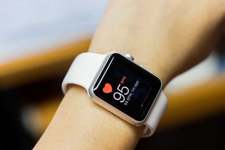 A smart watch with heart rate monitor.