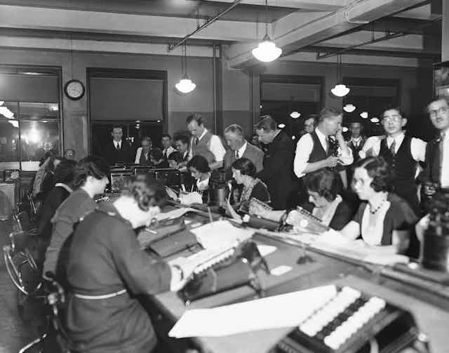 A scene from a newsroom in 1934