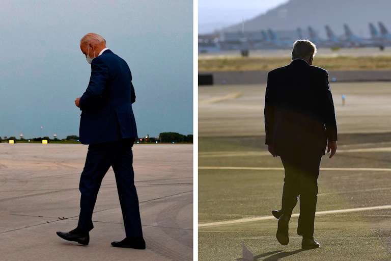 Presidential rivals Joe Biden and Donald Trump walking away from camera.