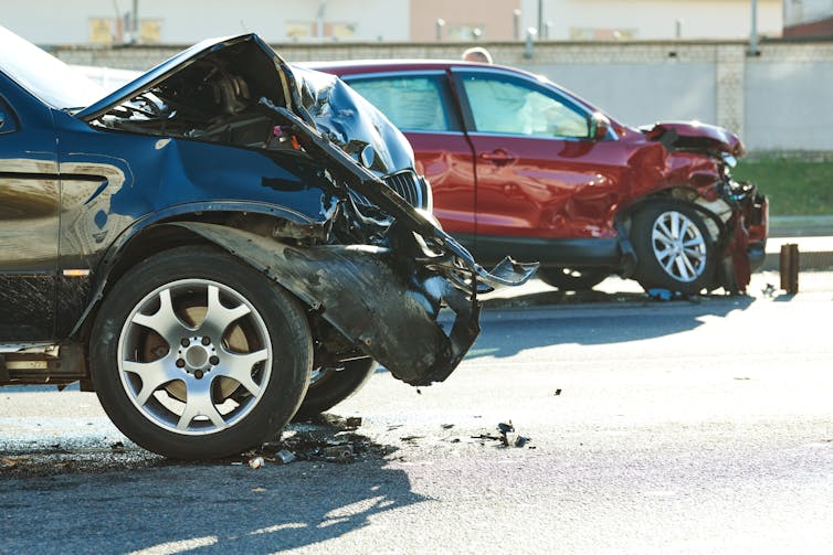 Two cars are damaged after an accident.