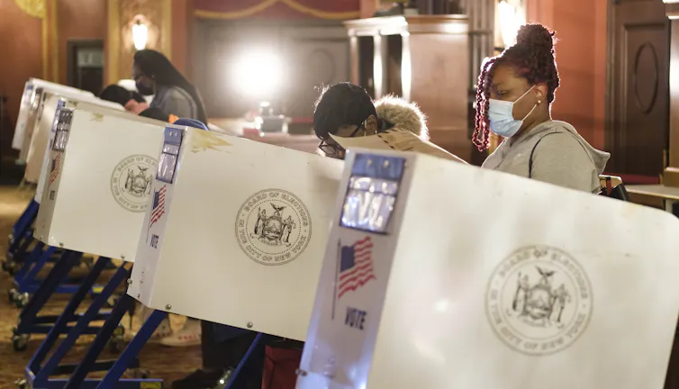 People casting early ballots in New York for the US election, October 2020.