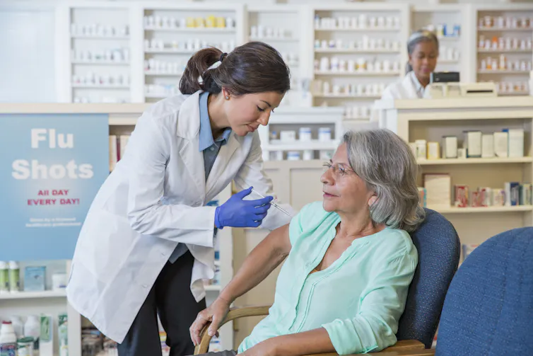 The flu vaccine carries only a dead version of the virus.
