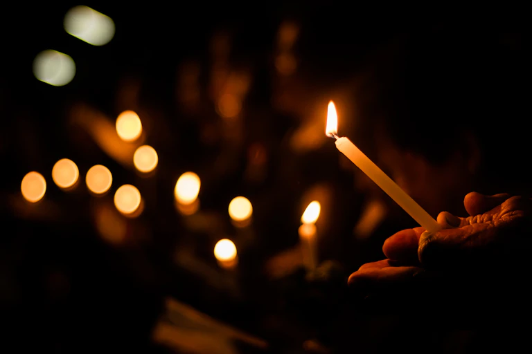 Candles light up the dark