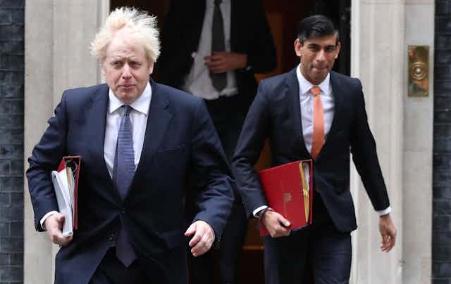 Boris Johnson and Rishi Sunak exit Downing Street door