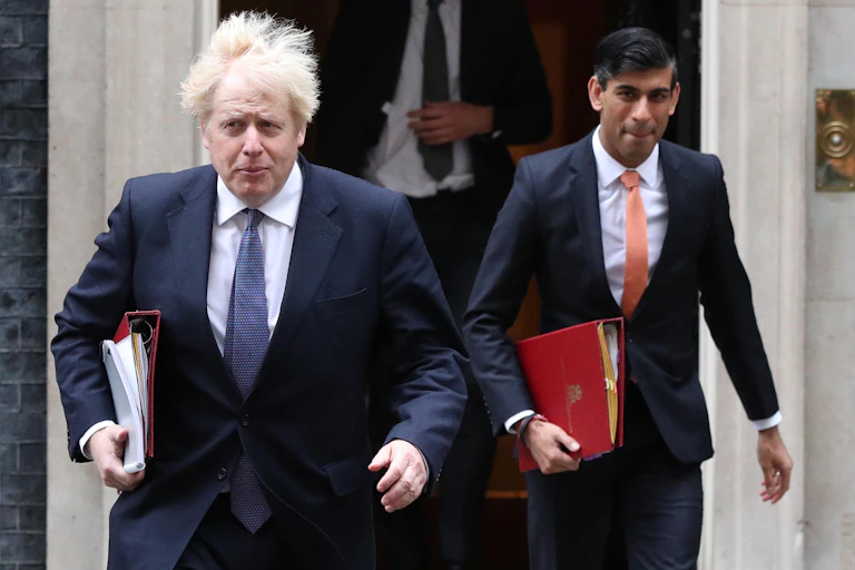 Boris Johnson and Rishi Sunak exit Downing Street door