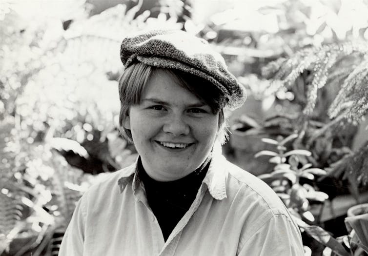 Black-and-white photo of Kozachenko wearing a newsboy hat