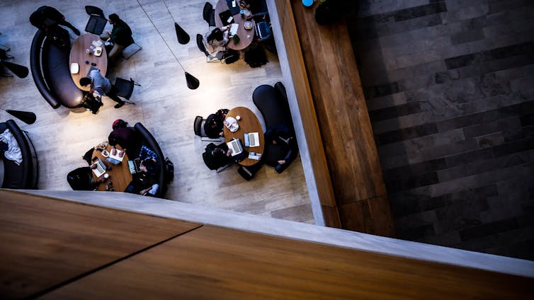 Students studying viewed from above.