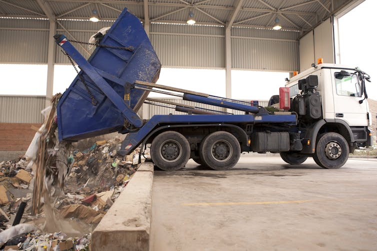 A truck dumping waste to get incinerated