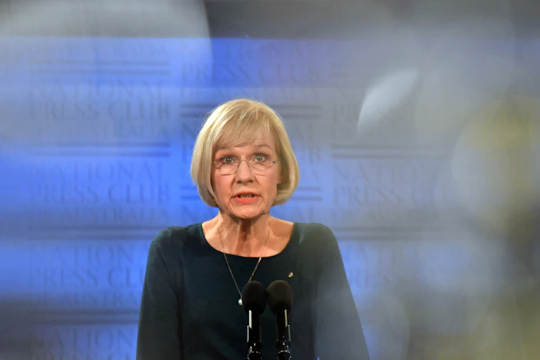 Women delivers a speech