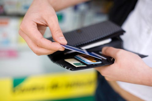 Why is the government trying to make the cashless debit card permanent? Research shows it does not work