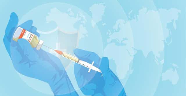 Illustration of gloved hands drawing up COVID vaccine into syringe against global map background