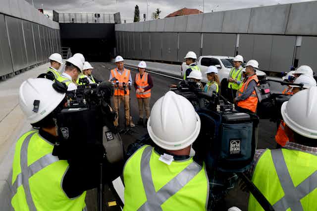 Media covering road project announcement