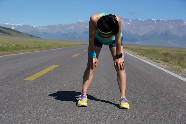 Woman tired from running.