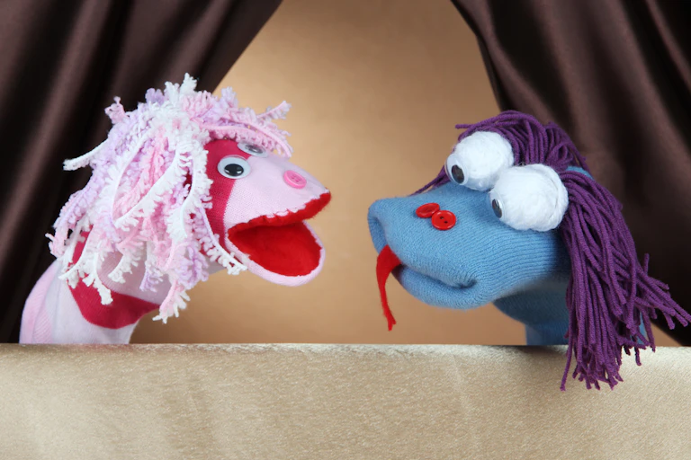 Two puppets talking to each other