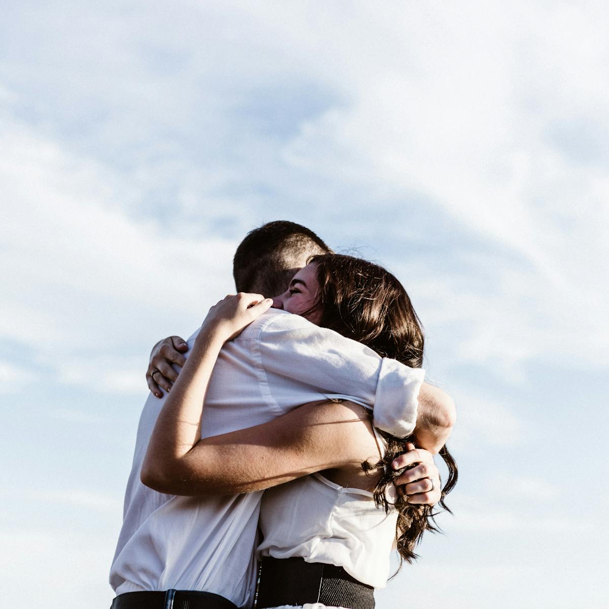 No, a hug isn't COVID-safe. But if you have to do it, here's what ...