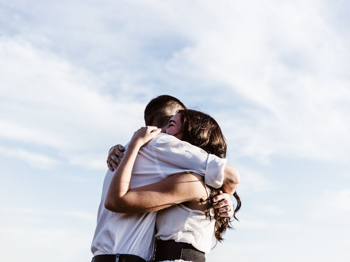 No, a hug isn't COVID-safe. But if you have to do it, here's what ...