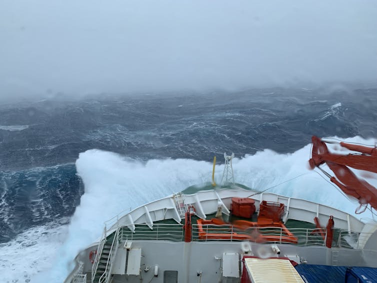 Ship battling high waves