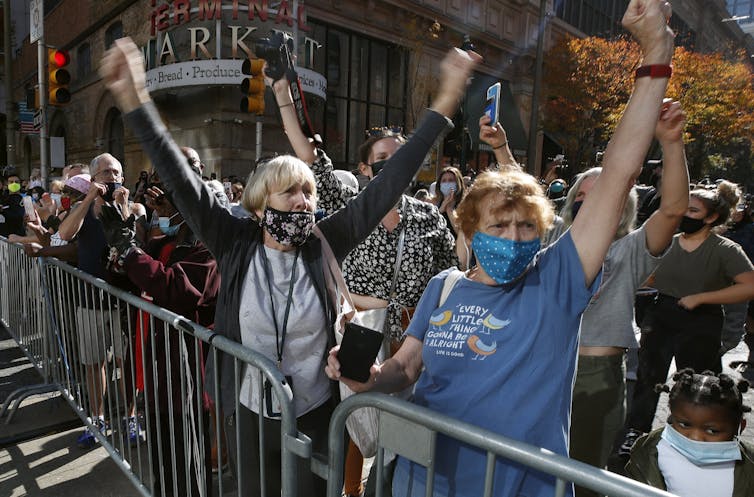 People celebrate the election being called for Biden outside the Pennsylvania Convention Center in Philadelphia on Nov. 7.