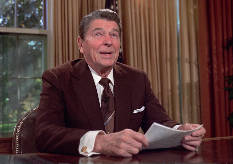 Ronald Reagan in the Oval Office.