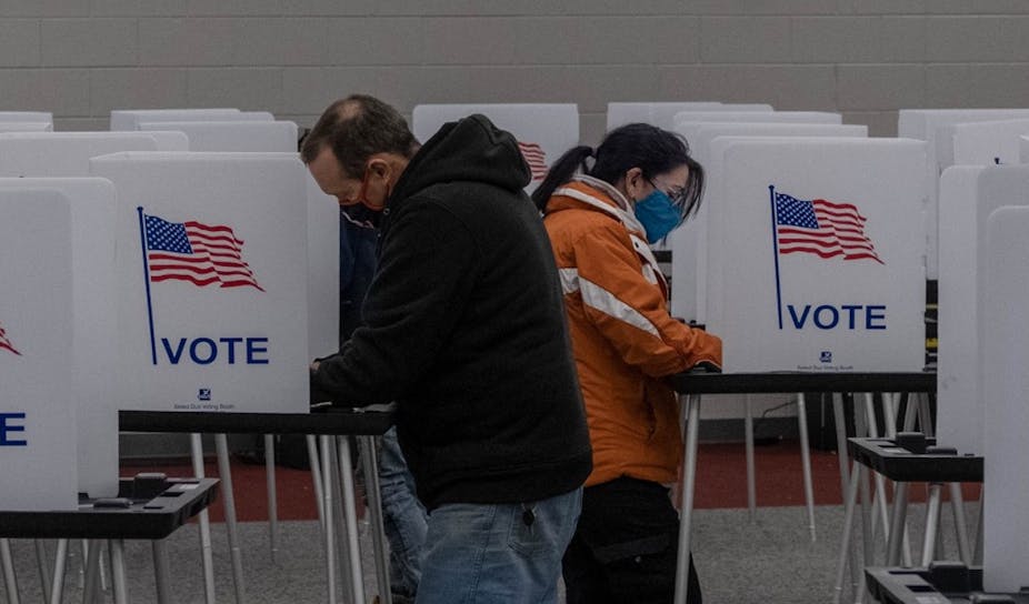 Les résidents ont voté le 3 novembre 2020 au Mott Community College de Flint, dans le Michigan. 