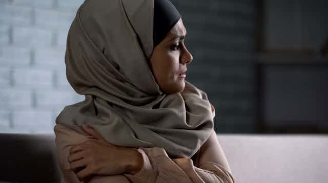 Crying muslim female.