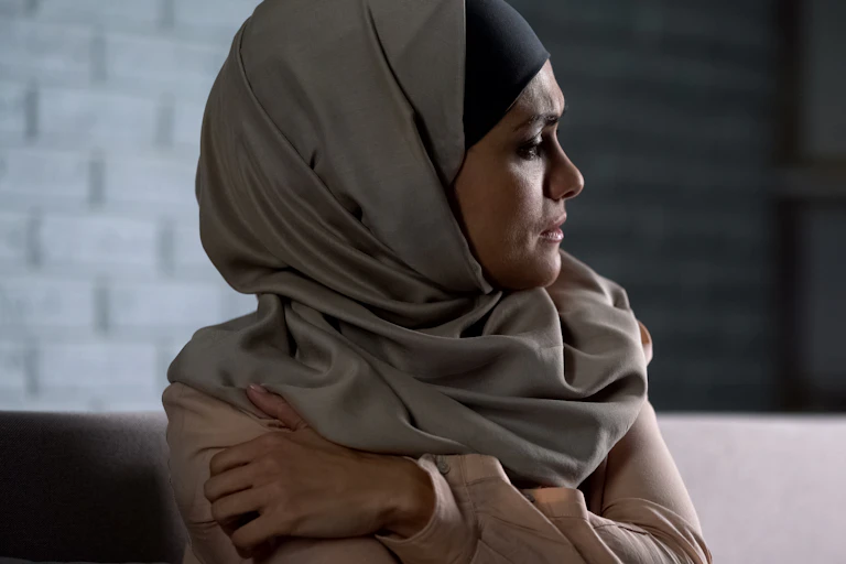 Crying muslim female.
